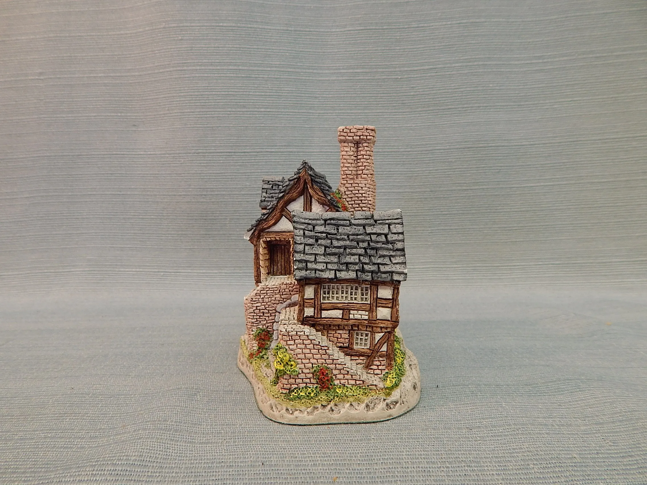 British Cottage Figurines - Set of 7